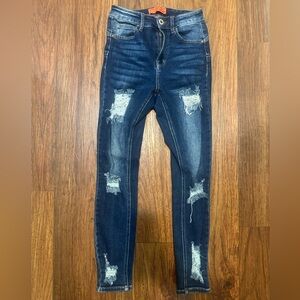 Distressed Blue Jeans